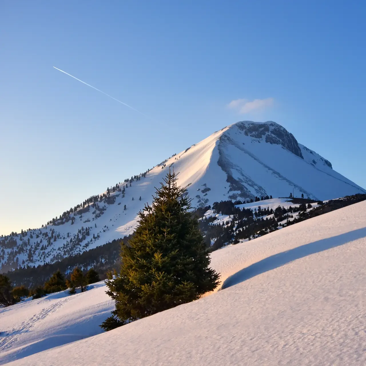 Mount Dirfys snow covered peak in Evia, winter mountain landscape near Chalkida